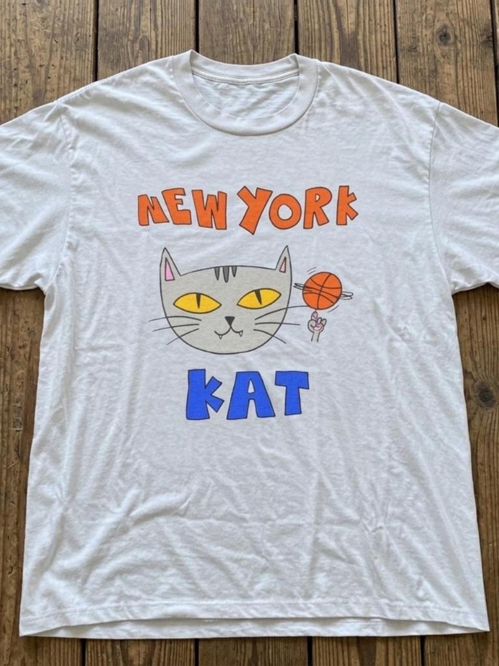 Gildan White New York Kat Graphic Tee with Orange & Blue Print